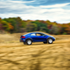 Illustration for article titled The Kia Forte Koup Mud Bogger Concept Is Badass Even If Its Two-Wheel Drive